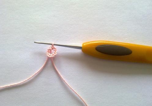 Knitting a white hat for summer!