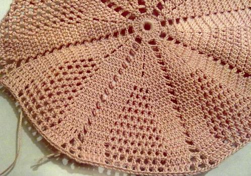 Knitting a white hat for summer!