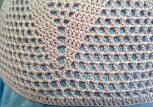 Knitting a white hat for summer!