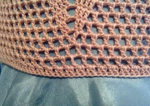 Knitting a white hat for summer!