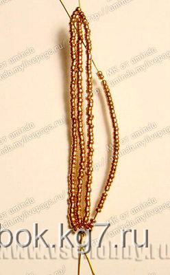 Свободный конец проволоки пропустите между осью и дугой Свободный конец проволоки пропустите между осью и дугой