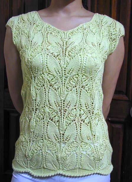 The website is in Russian, but there are lots of pictures using the lace pattern in different ways and there is a chart. free pattern