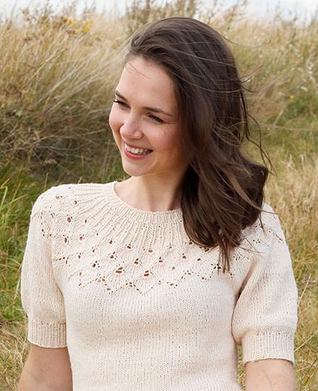 Swing by Spring Top / DROPS 222-32 - Knitted sweater in DROPS Belle. Piece is knitted top down with round yoke, lace pattern, leaf pattern and short balloon sleeves. Size: S - XXXL