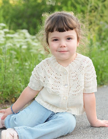 Marshmallow Morning Cardigan / DROPS Children 49-2 - Knitted, short jacket for children in DROPS Safran or DROPS BabyMerino. Piece is knitted top down with round yoke, I-cord, wave pattern and short sleeves. Size 2 - 12 years