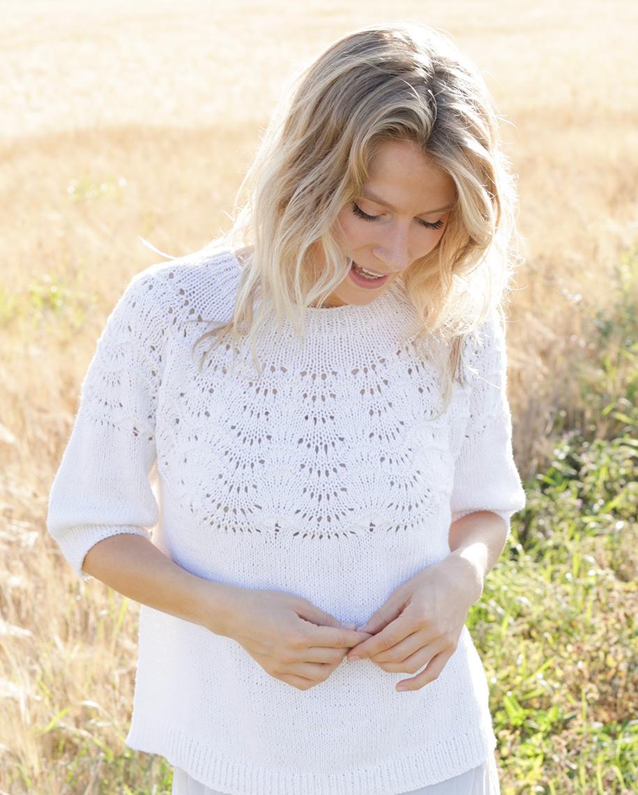 Peace Dove / DROPS 249-21 - Knitted jumper with ¾ sleeves in DROPS Belle or DROPS Cotton Light. Piece is knitted top down with round yoke and wave pattern on yoke. Size: S - XXXL