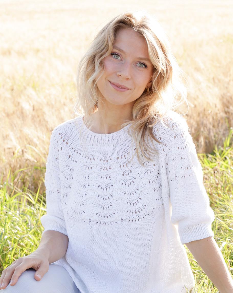 Peace Dove / DROPS 249-21 - Knitted jumper with ¾ sleeves in DROPS Belle or DROPS Cotton Light. Piece is knitted top down with round yoke and wave pattern on yoke. Size: S - XXXL